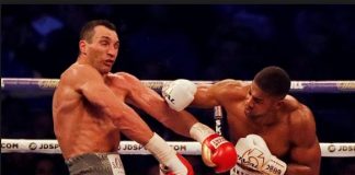 Joshua boxes Klitschtko down in a thriller to claim IBF,WBA,IBO titles