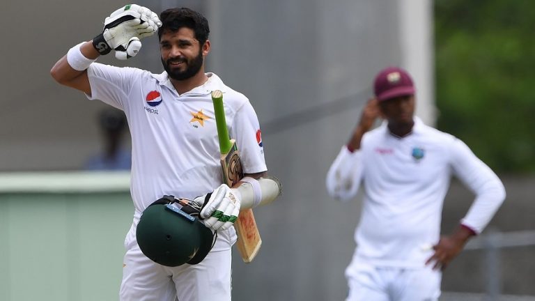 Azhar Ali does the salute after making his 14th Test century against West Indies