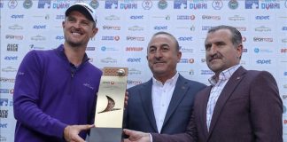 Golf Turkish Airlines Open 2017 Turkish Foreign Minister Mevlut Cavusoglu (C), Turkish Youth & Sports Minister Osman Askin Bak (R) and Justin Rose (L) of England