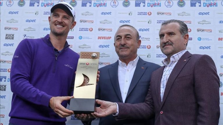 Turkish Foreign Minister Mevlut Cavusoglu (C), Turkish Youth & Sports Minister Osman Askin Bak (R) and Justin Rose (L) of England