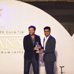 Shahid Afridi handing over trophy to Babar Azam