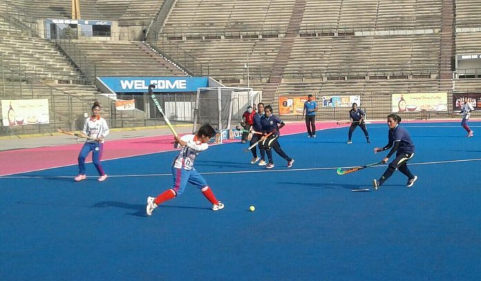 WAPDA player unleashing cross into HEC circle National Women Hockey Championships