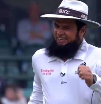 Cricket Records: Aleem Dar Umpire With Most ODIs Cricket umpire with a beard, wearing an ICC hat, smiling and celebrating during a match. The image captures his joyful reaction after making a significant decision, highlighting his role in setting cricket umpire records.
