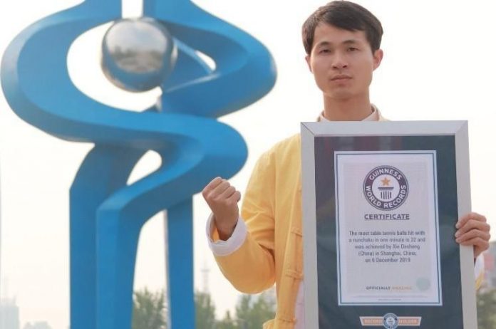 Martial-artist-hits-table-tennis-balls-with-nunchucks-for-Guinness-record