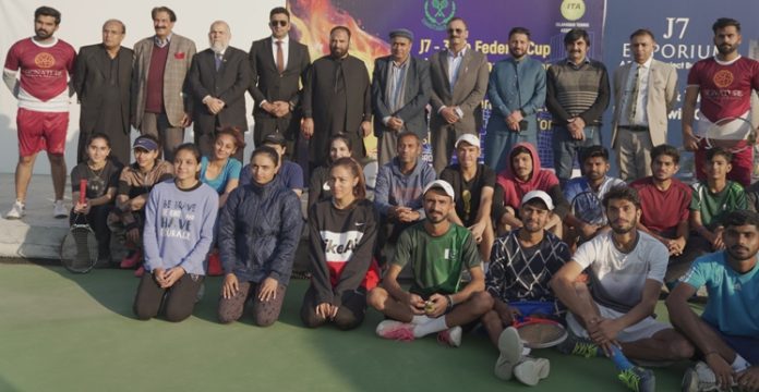 Group Photo with Mr. Maqbool Hussain Chairman J7 Group